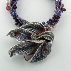 Leaves and zircon with garnet ***